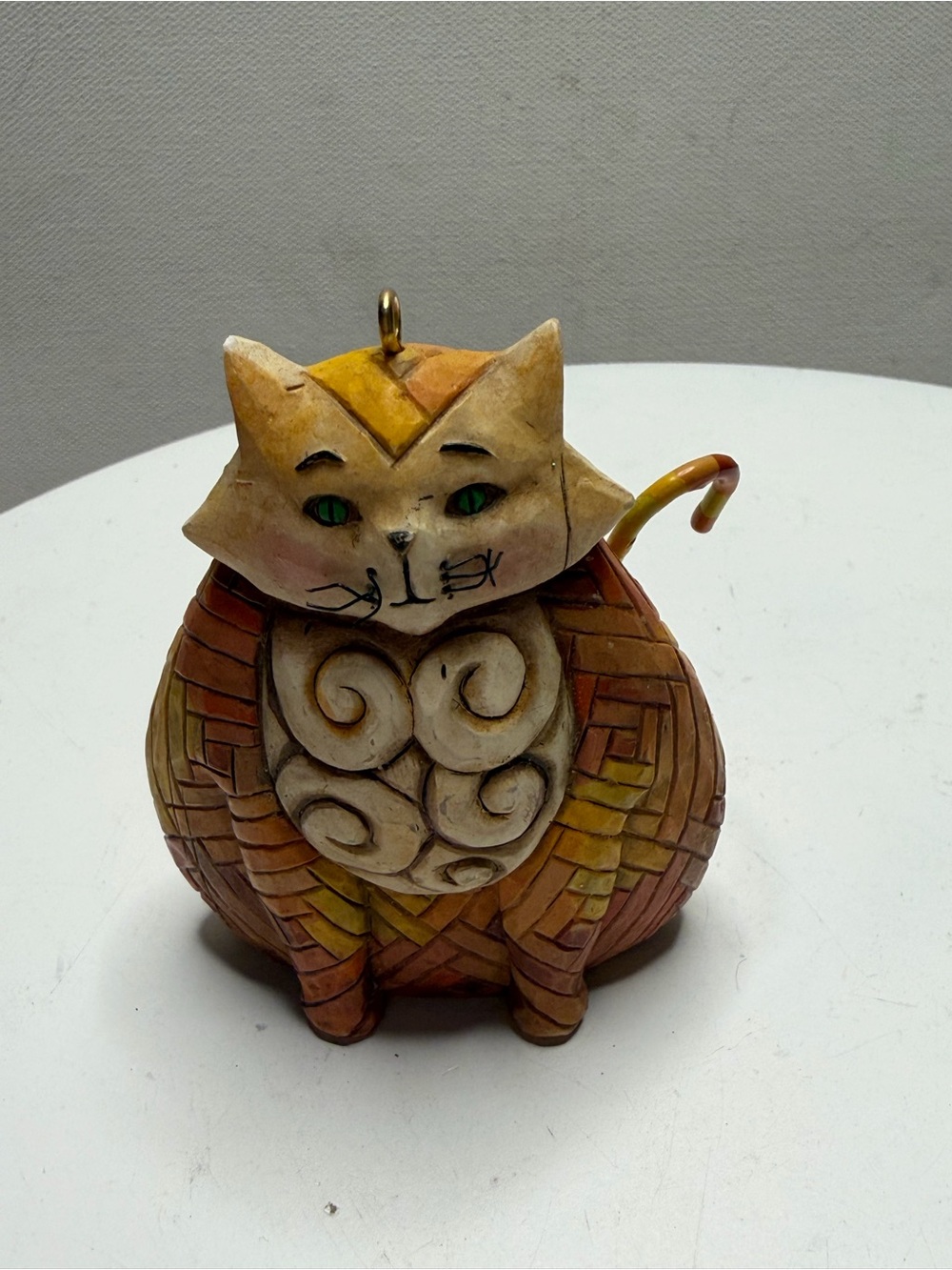 Handcrafted Ceramic Cat Figurine with Whimsical Swirl Belly